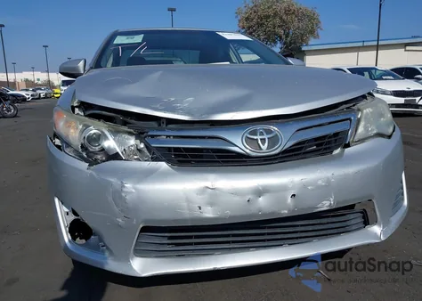 2012 Toyota Camry Le z USA, uszkodzony, nr VIN 4T4BF1FKXCR244890